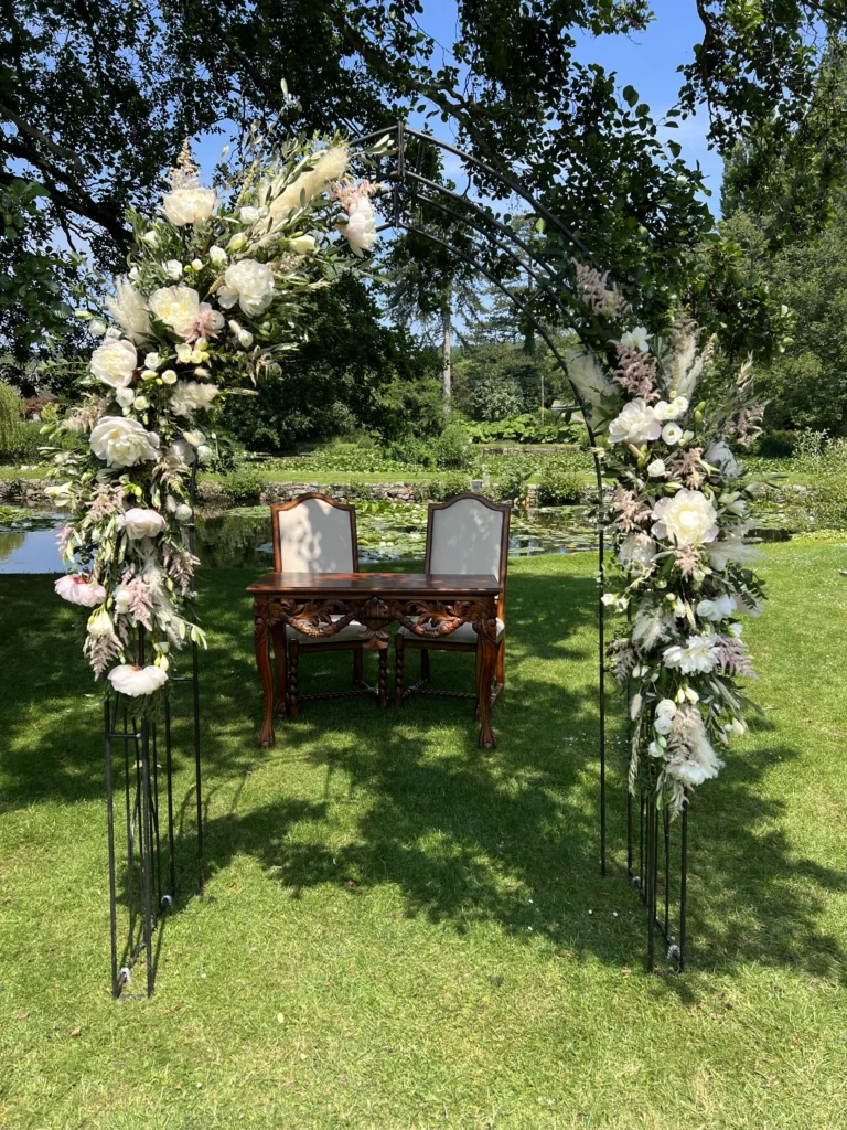 Asymmetrical wedding arch with pampas grass and dried crop details