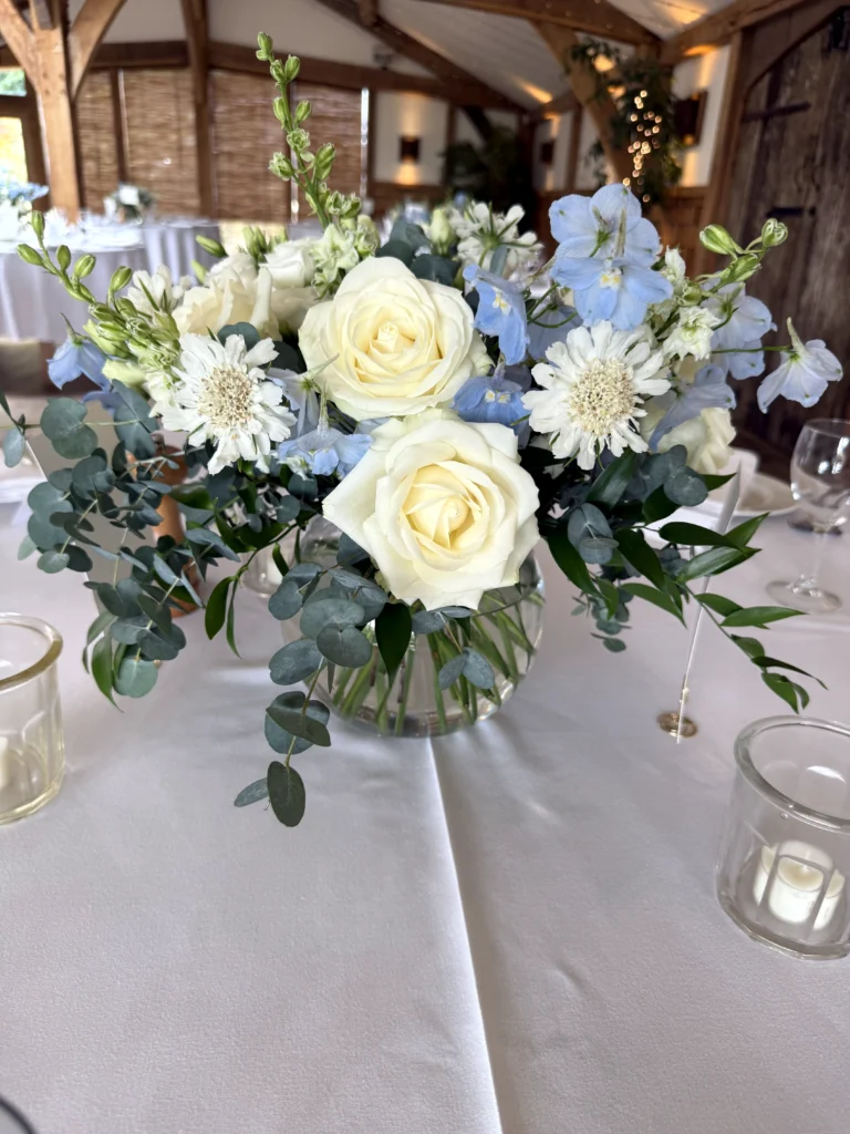 Wedding table display in blue and white tones at Cripps Barn