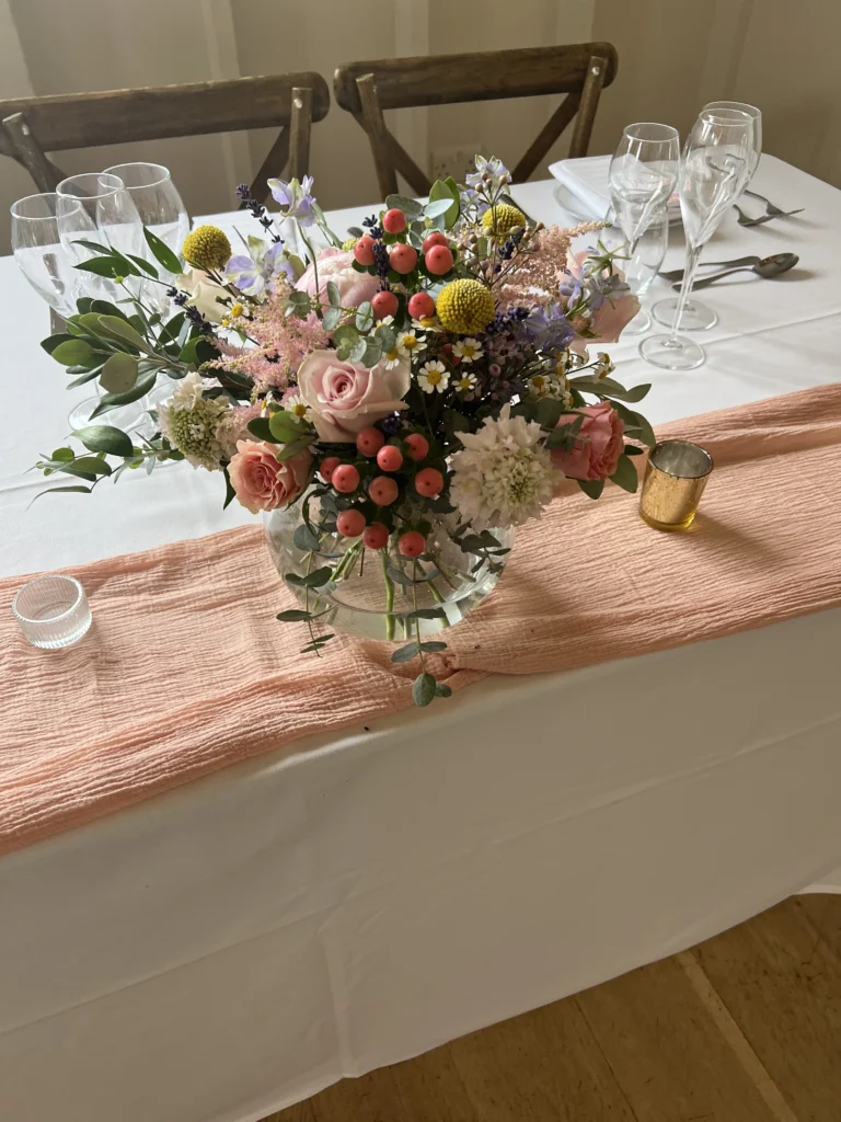 Fishbowl floral centrepiece in a bohemian style