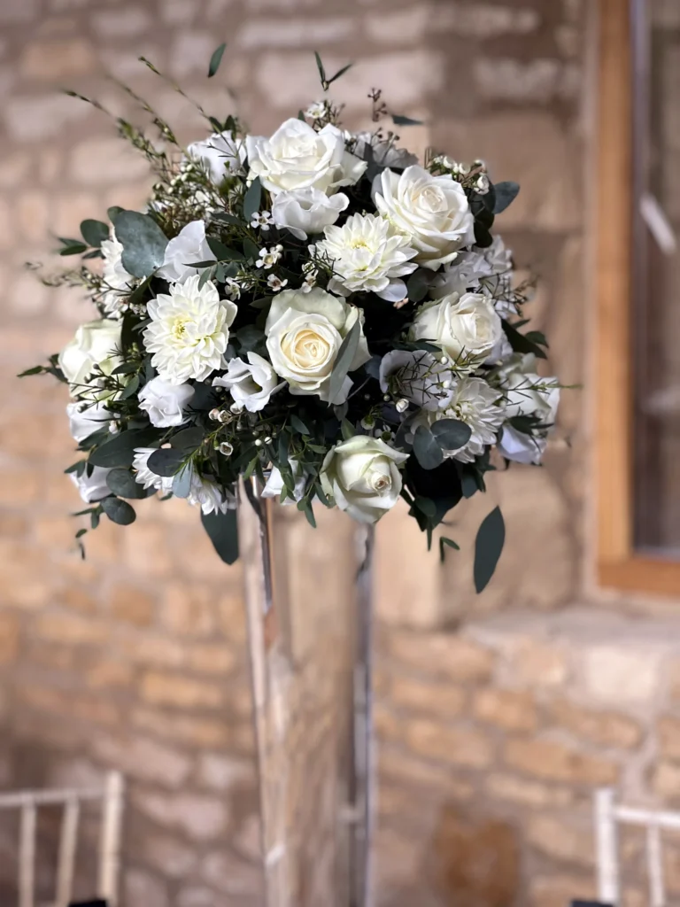 Elegant white and green glass lily vase display