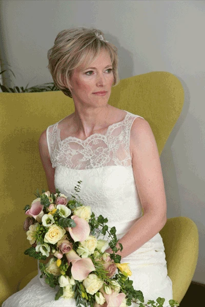 A vintage style shower bouquet using trailing ivy. Cowley Manor, Cheltenham.