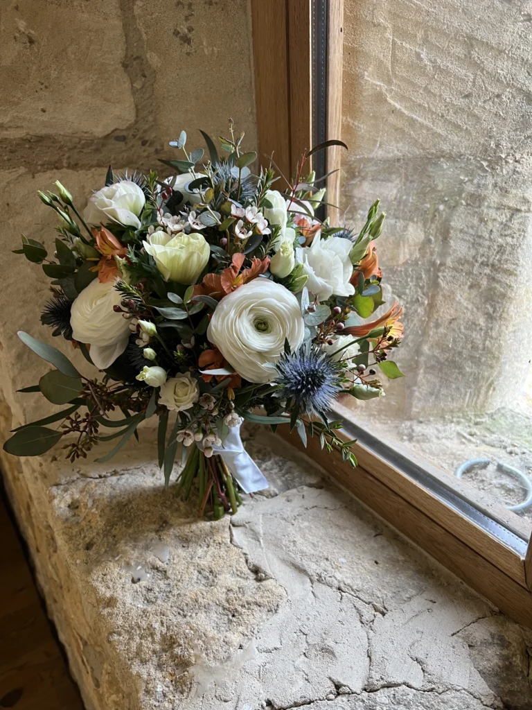Autumnal luxury wedding bouquet with Ranunculus