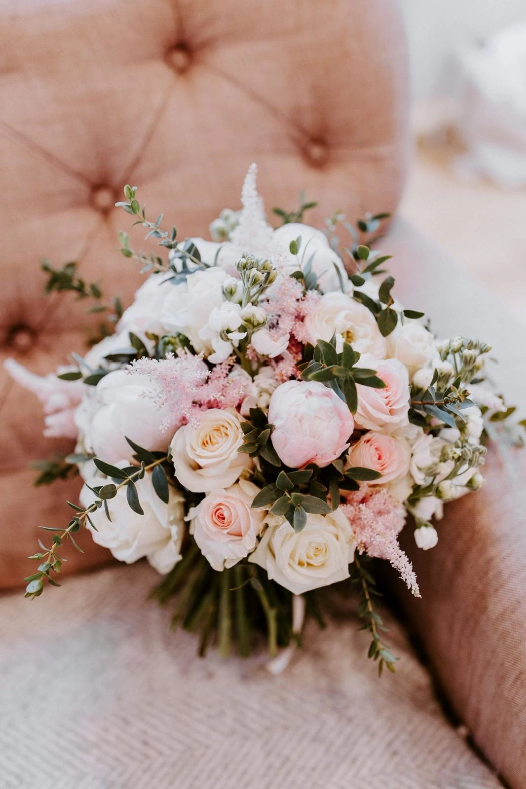 Blush and white bridal bouquet with peonies and roses, at Hyde House