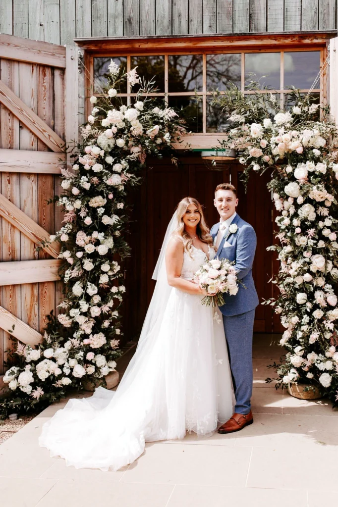 Wedding arch floral styling at Hyde House, Cheltenham Cotswolds