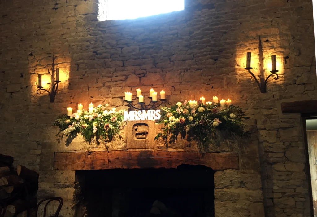 Floral installation in barn at Cripps Barn, Bibury