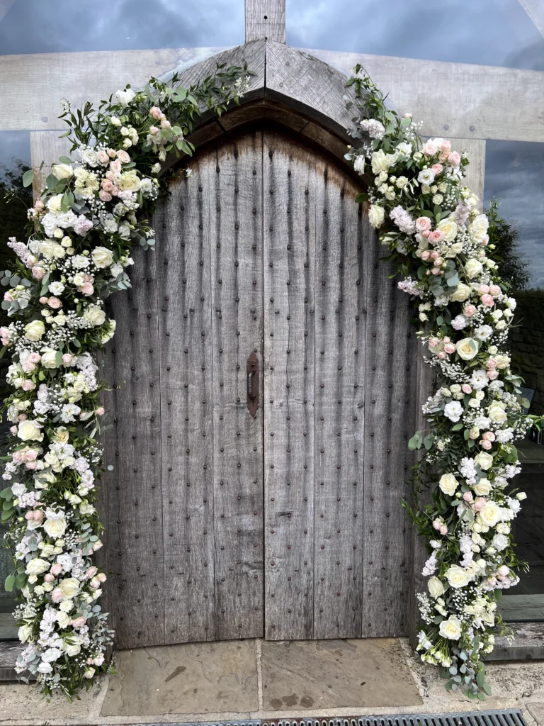Wedding at Cripps Barn, with the floral design and installed by Cotswold Blooms