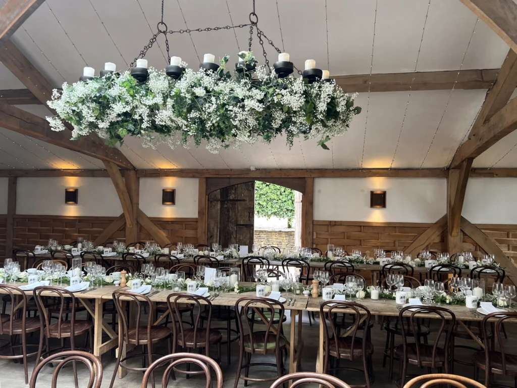 Reception table flowers at Cripps Barn wedding
