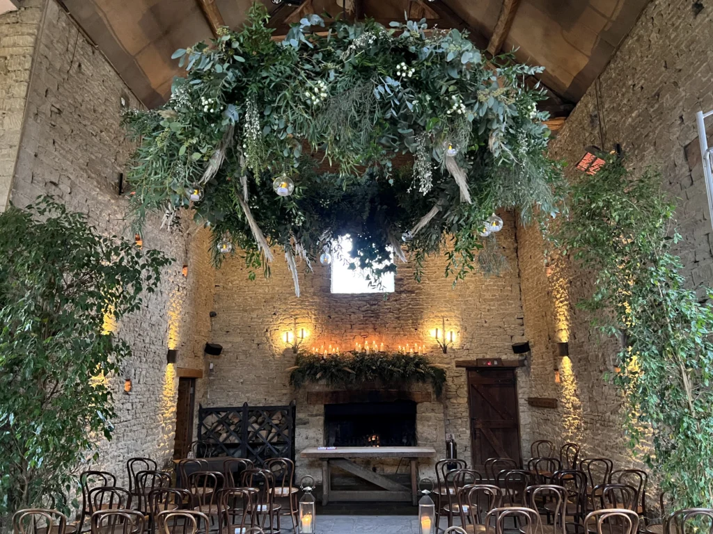 Large hanging floral wedding design by Cotswold Blooms at Cripps Barn