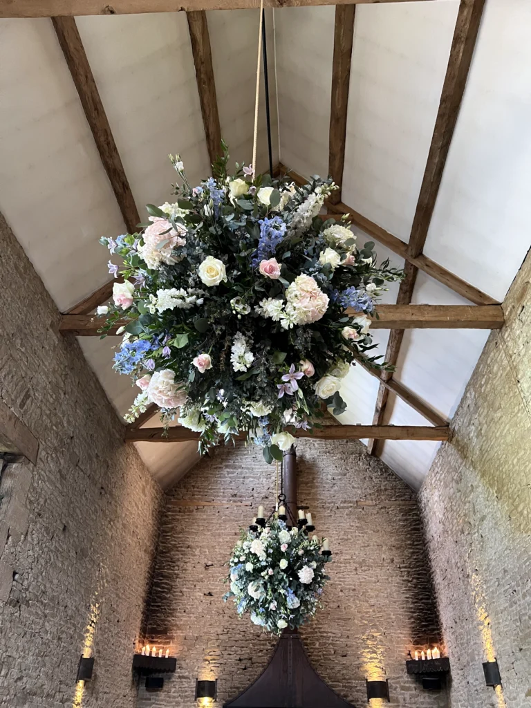 Large hanging floral wedding design by Cotswold Blooms at Cripps Barn