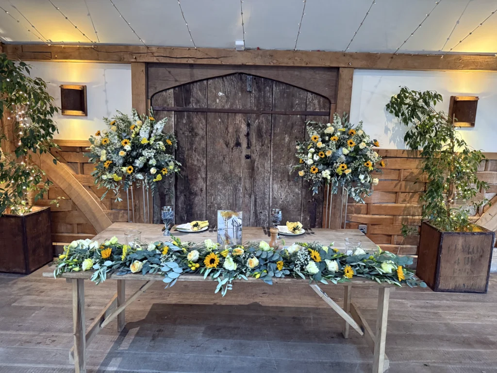 Wedding at Cripps Barn, with the floral design and installed by Cotswold Blooms