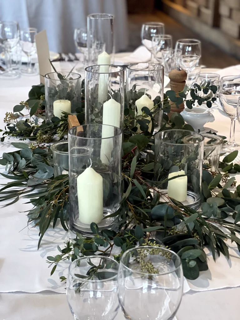 Reception table flowers at Cripps Barn wedding