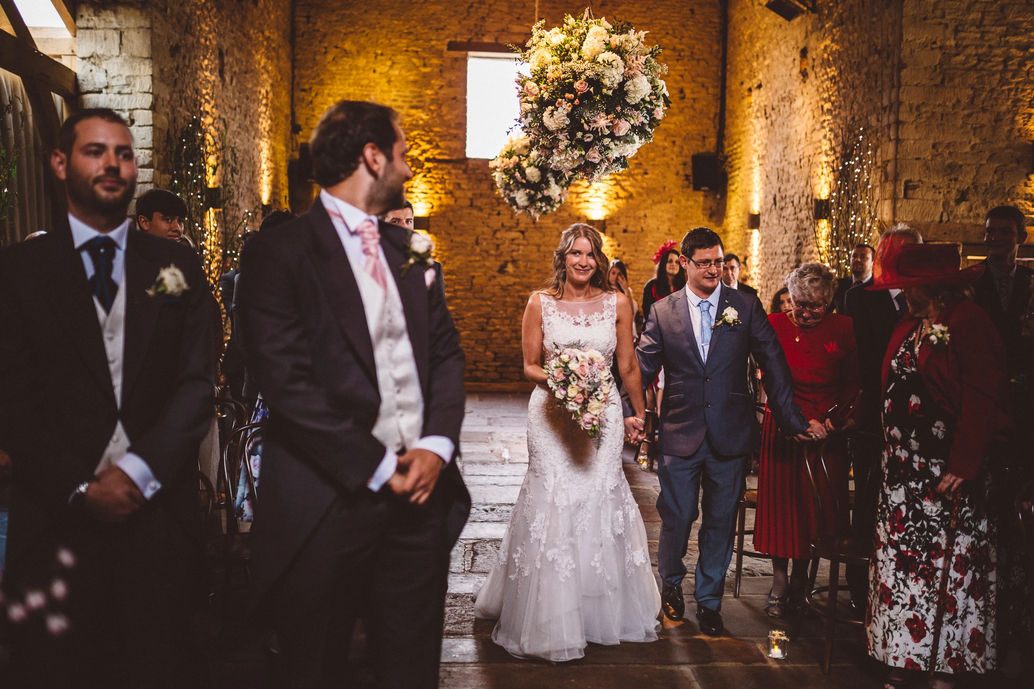 Wedding at Cripps Barn, with the floral design and installed by Cotswold Blooms