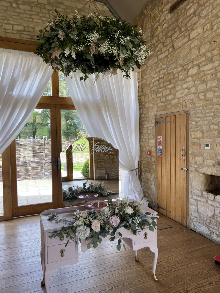 Barn at Upcote ceremony floral installation Cotswolds wedding florist