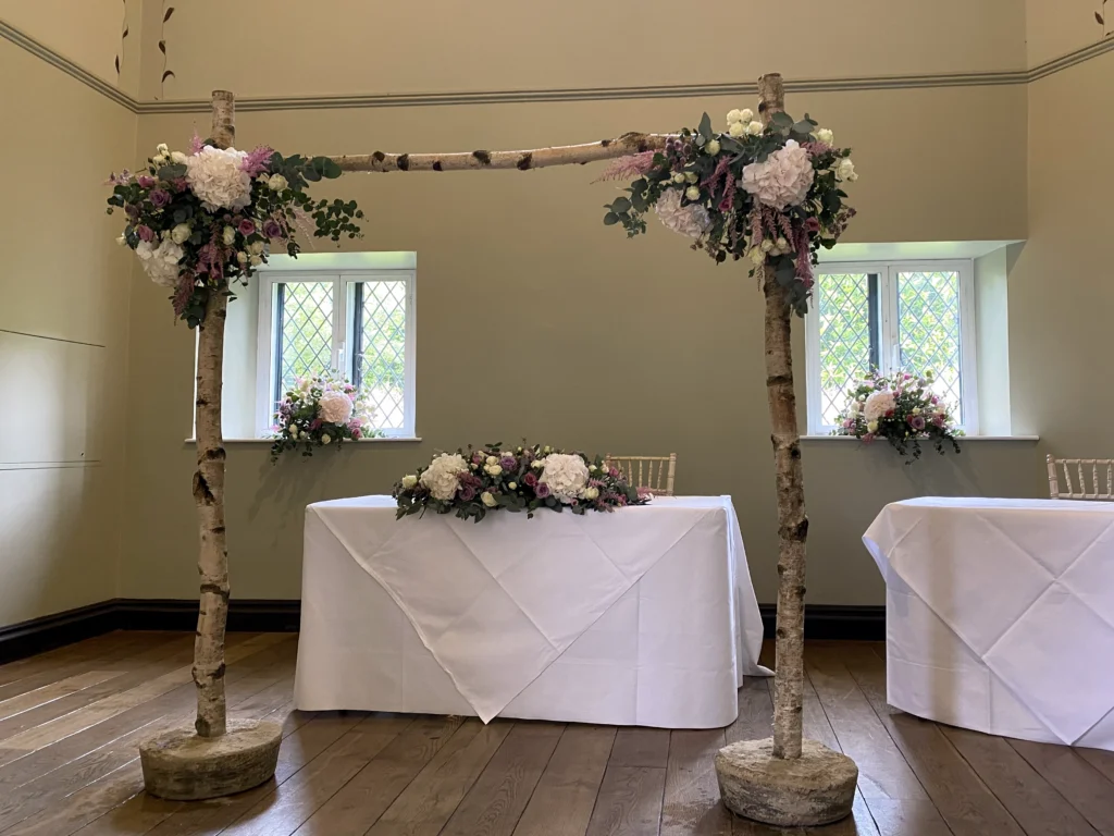 Ellenborough Park 7 Cotswold Blooms is a luxury wedding florist in Cheltenham and the Cotswolds, creating refined, bespoke floral designs using seasonal British flowers. Floral installation at Ellenborough Park wedding Cotswold Blooms