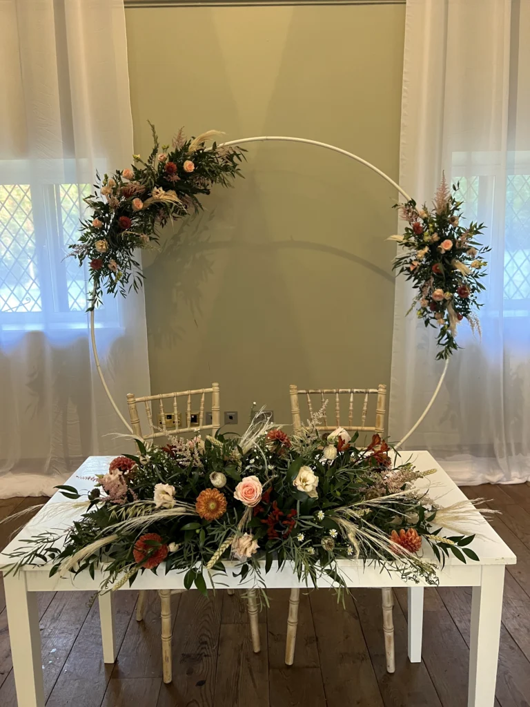 Ellenborough Park 9 Cotswold Blooms is a luxury wedding florist in Cheltenham and the Cotswolds, creating refined, bespoke floral designs using seasonal British flowers. Floral installation at Ellenborough Park wedding Cotswold Blooms