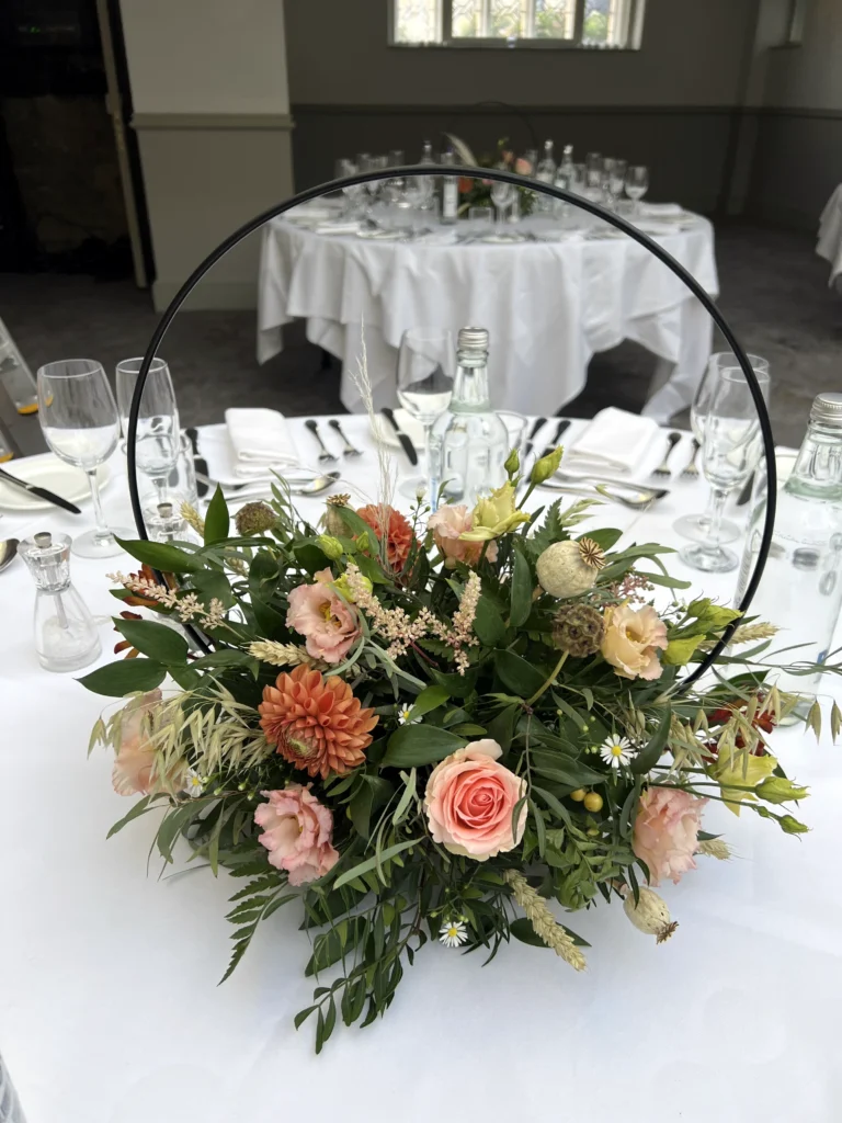 Ellenborough Park 15 Cotswold Blooms is a luxury wedding florist in Cheltenham and the Cotswolds, creating refined, bespoke floral designs using seasonal British flowers. Wedding table flowers Ellenborough Park Cheltenham florist