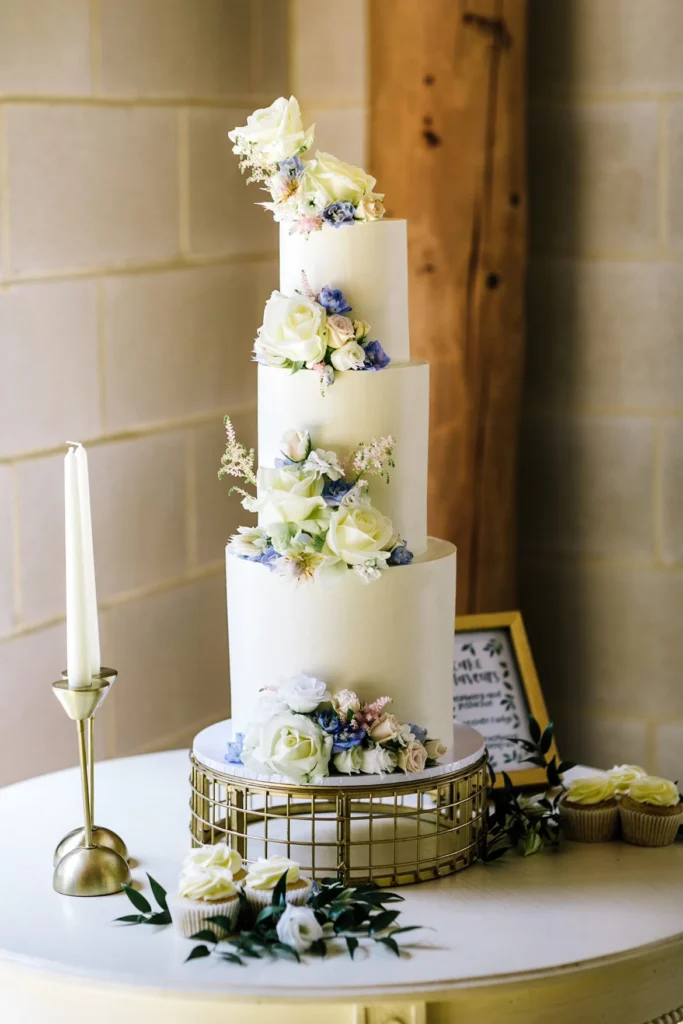 Elegant cake decoration featuring flowers with hints of blue at Owlpen Manor