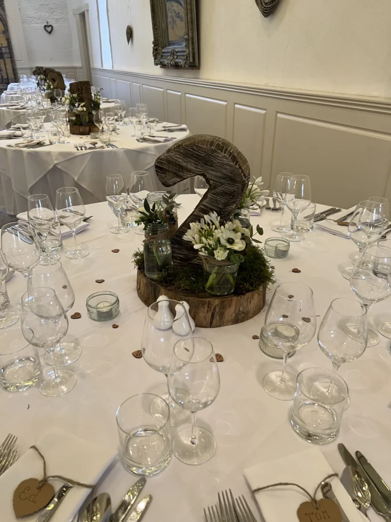 Table centrepiece wedding flowers Merriscourt White Barn