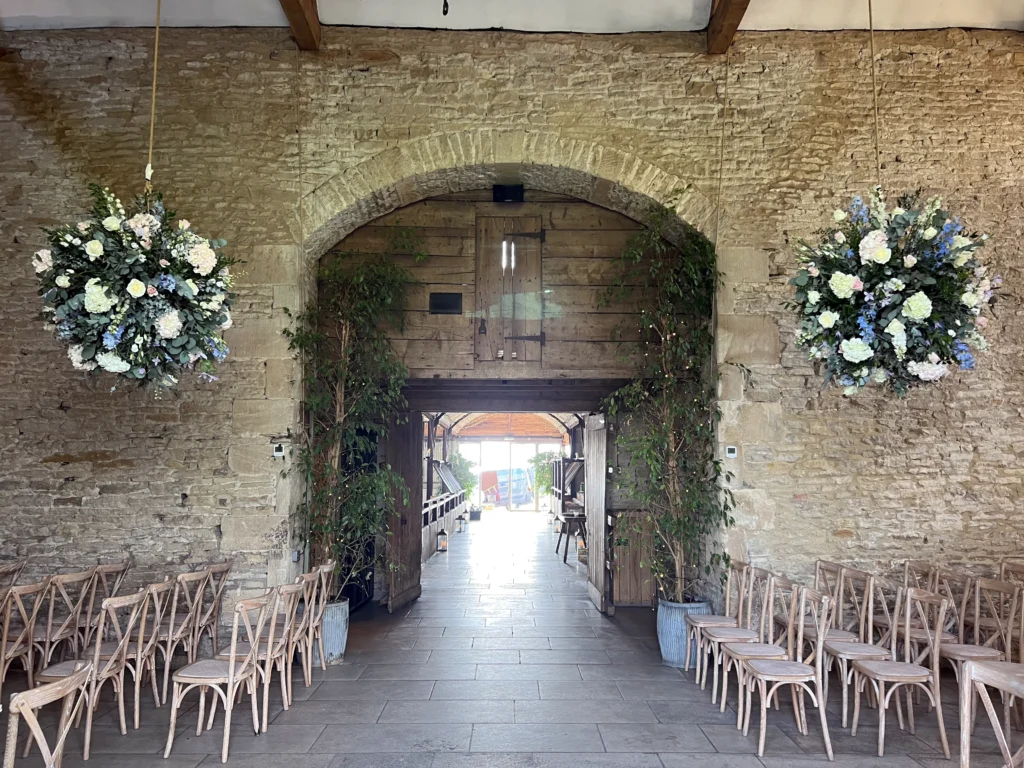 Stone Barn wedding venue flowers by Cotswold Blooms