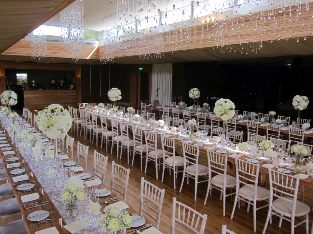 Elmore Court floral displays of roses and gypsophila with elevated flower balls