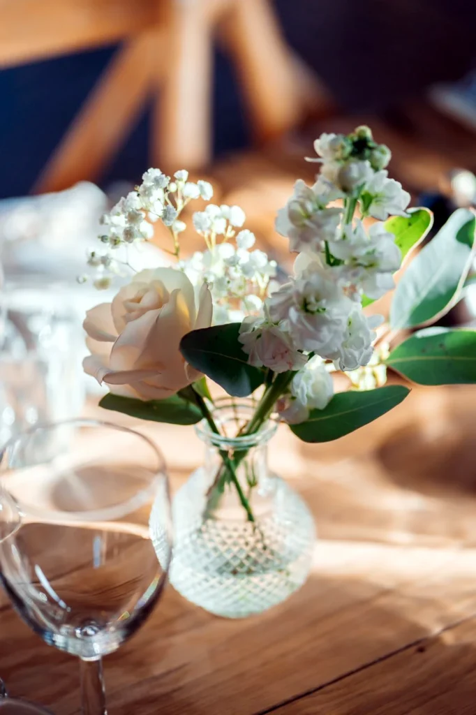 Soft floral arrangement with stocks, blush roses and gypsophila at The Old Gore