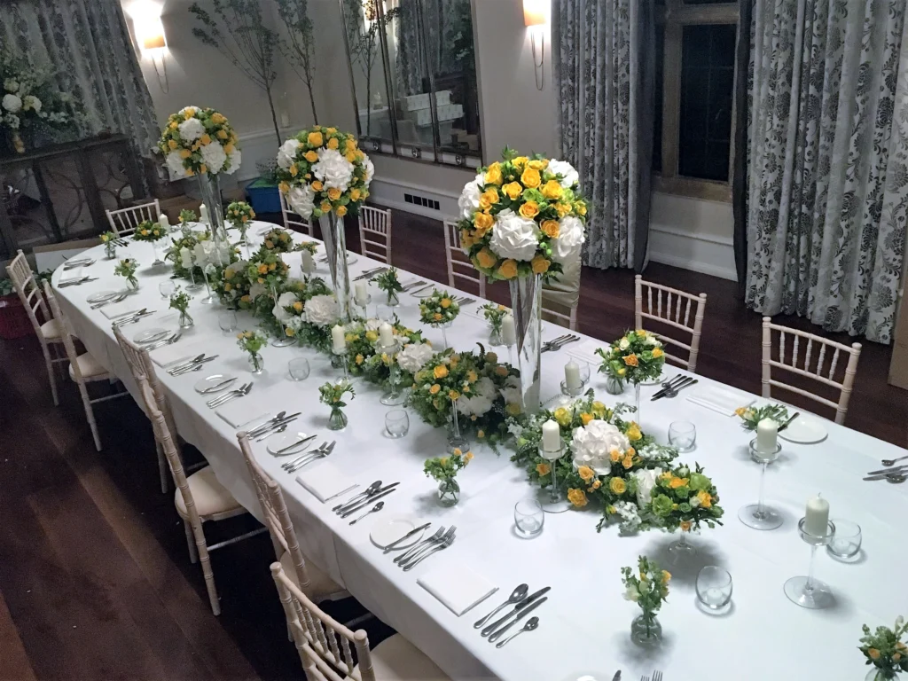Exclusive wedding floral design with yellow and white blooms at Foxhill Manor