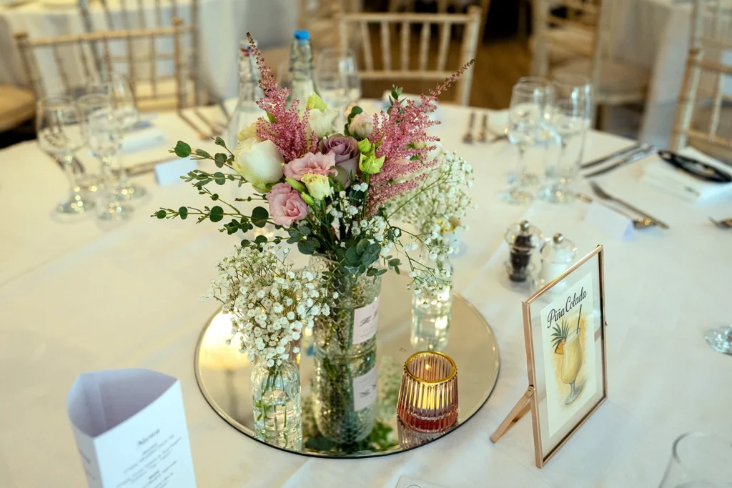 Wedding prosecco bottle filled with natural floral styling